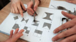 Hands point to and mark answers on a visual pattern test.